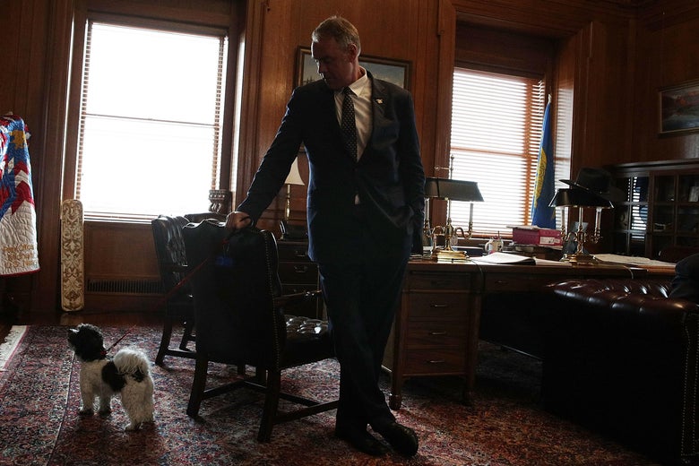Interior Secretary Ryan Zinke and his dog in his office for a Take Your Dog to Work Day event on May 5, 2017 at the Interior Department in Washington, DC.